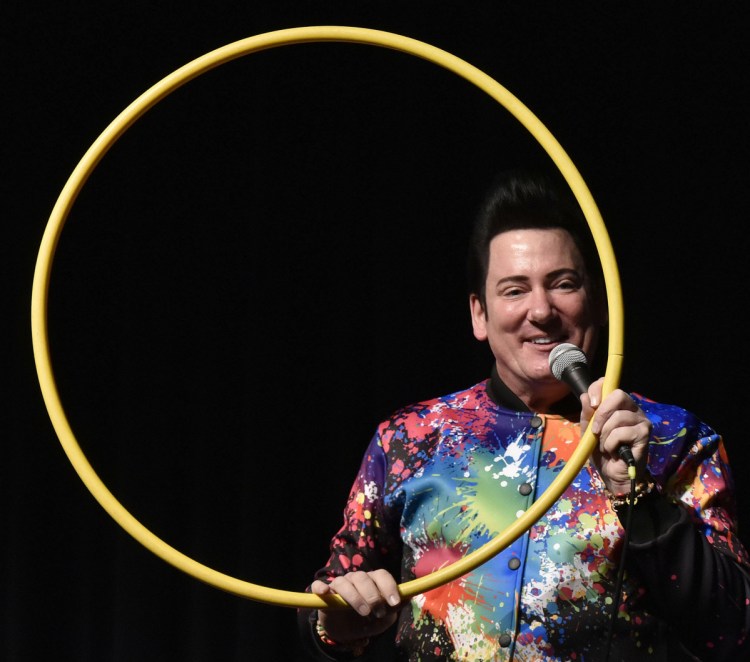 Motivational speaker Retro Bill's presentation Tuesday to Lawrence High School students at the Williamson Center in Fairfield used many colorful props, including a hula hoop, to illustrate that good deeds are cyclical and come back to you.