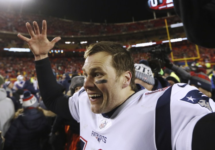 New England Patriots quarterback Tom Brady celebrates after defeating the Kansas City Chiefs in the AFC Championship NFL game Sunday in Kansas City, Mo. NFL security is investigating whether someone in the stands attempted to shine a laser into Brady's face in the fourth quarter.