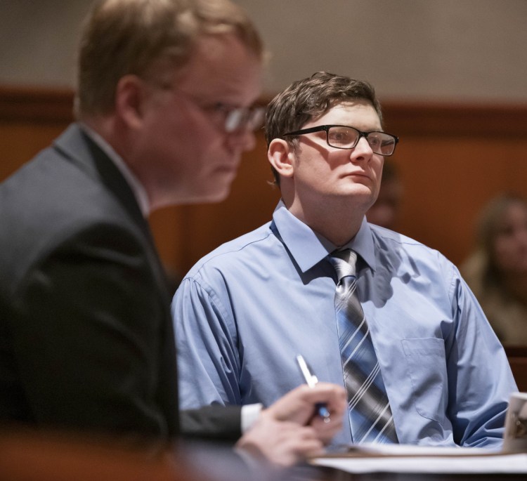 Murder defendant Noah Gaston, right, listens during a court hearing Tuesday on admissible evidence. At left is James Mason, one of his attorneys.