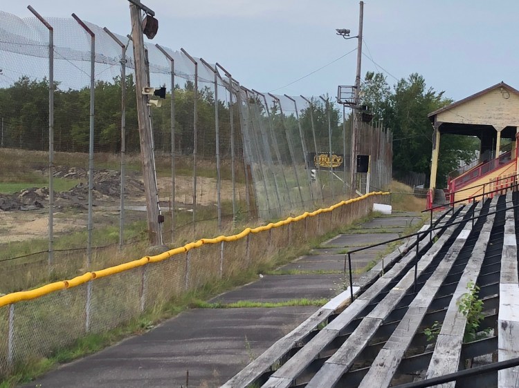 The Unity Raceway grandstands overlook a racetrack that was removed of asphalt at the end of the 2017 season. Repairs are needed to the covered grandstand, some of the fencing and other parts of the property.