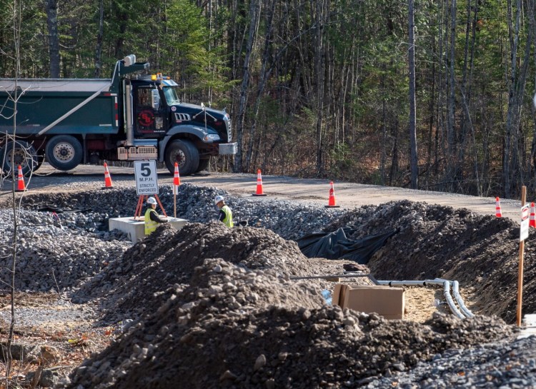 Construction proceeds Wednesday on the $250 million converter station in Lewiston — a central piece of the embattled transmission line project — despite Maine residents passing a referendum to ban "high-impact electric transmission lines in the Upper Kennebec Region."