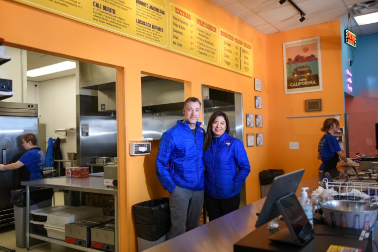 Josh and Katherine Morin Mitchell at their restaurant, Luchador Tacos, in South Paris. The couple also operates locations in Windham; North Conway, New Hampshire; and, soon, Worcester, Massachusetts.