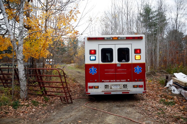 An ambulance crew from Industry Fire and Rescue departs on a long, bumpy dirt driveway after responding to a fall victim at a horse farm on Oct. 22.