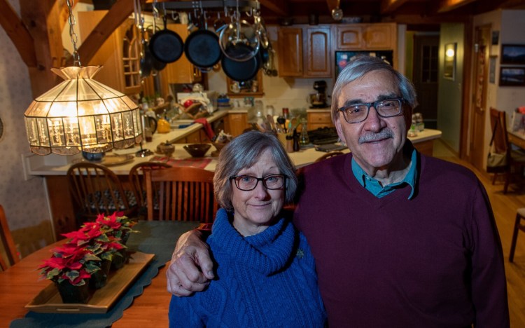Joyce and Carl Bucciantini at their house Friday night in Greene. The couple are winners of the 2021 Andrus Community Service Award. Named in honor of AARP founder Dr. Ethel Percy Andrus, the award celebrates and honors those who make a difference in the lives of others, according to AARP Maine.