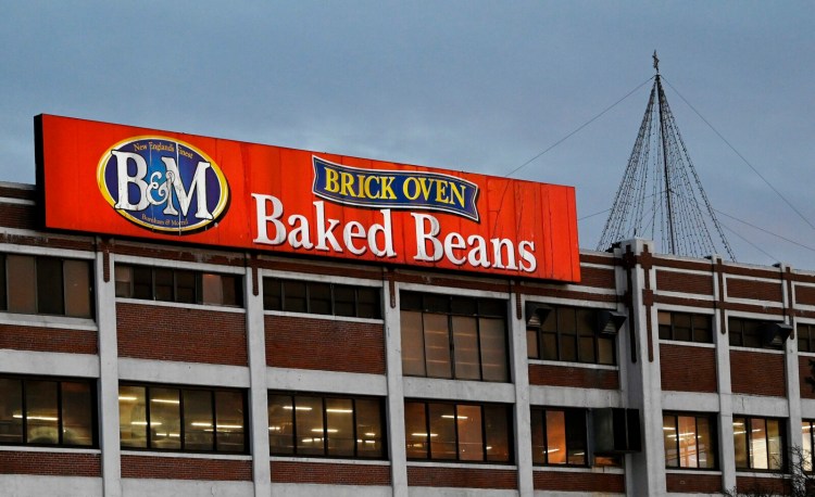 The Christmas tree display stands atop the B&M Baked Beans plant in Portland, shortly before it was lit on Thursday evening.