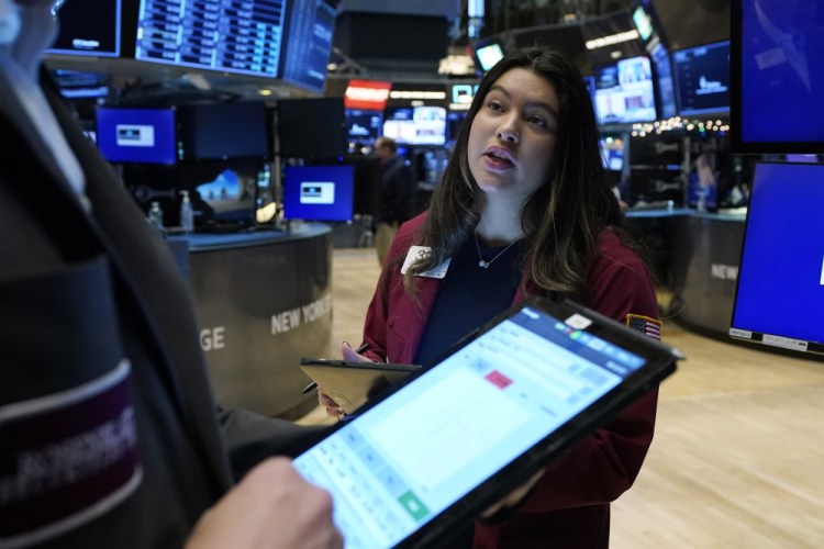 Trader Ashley Lara works on the floor of the New York Stock Exchange, Thursday. The S&P 500 saw its best day in seven weeks.