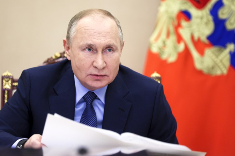 Russian President Vladimir Putin chairs a meeting on the situation of coal mining enterprises in Kuzbass, via videoconference in the Kremlin in Moscow, Russia. 