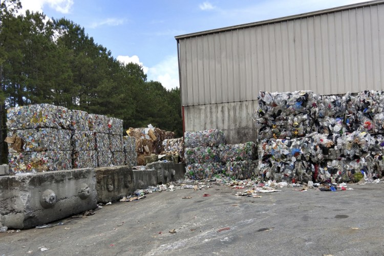 Plastic is baled for shipment at a materials recovery facility in the United States in 2018. America needs to rethink and reduce the way it generates plastics because so much of it is littering the oceans, the National Academy of Sciences recommends in a new report. 