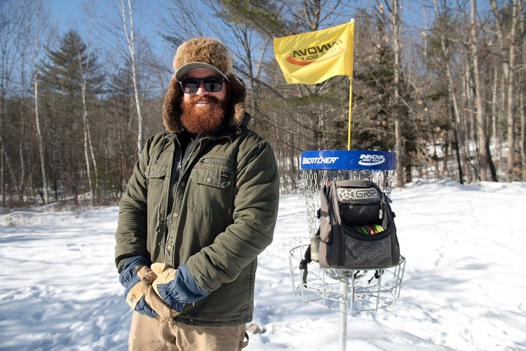 Alex Olsen stands Tuesday at his Devils Grove Disc Golf course on Grove Street in Lewiston.