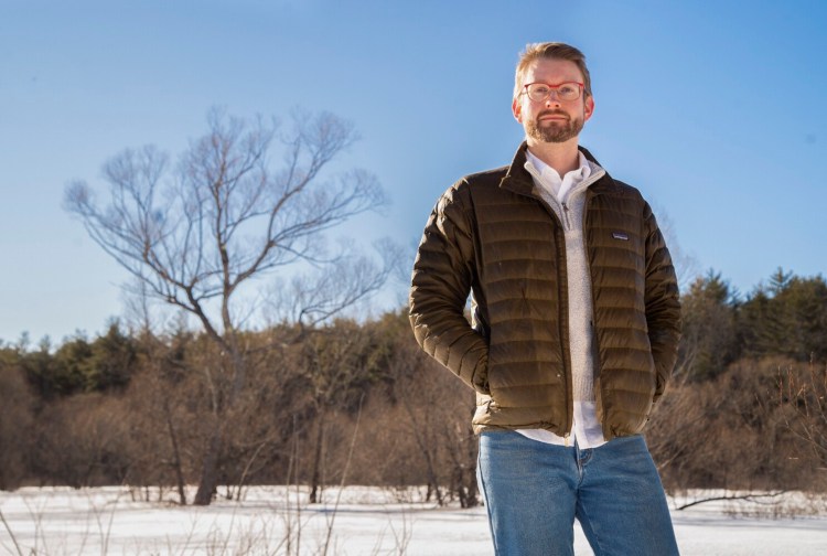 Dale Rappaneau, a law student who supports a bill to add guaranteed rights to privacy in the state Constitution, stands outside his rural home in Bowdoinham, a place where he cherishes the privacy.
