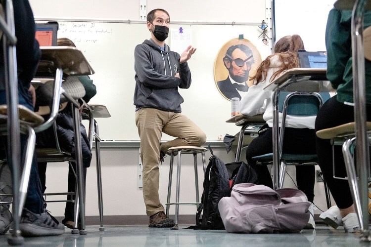 Isaiah Davis teaches his U.S. History I class Wednesday at Leavitt Area High School in Turner. Davis was recently awarded the Patience W. Norman Award for his work in and out of the classroom.