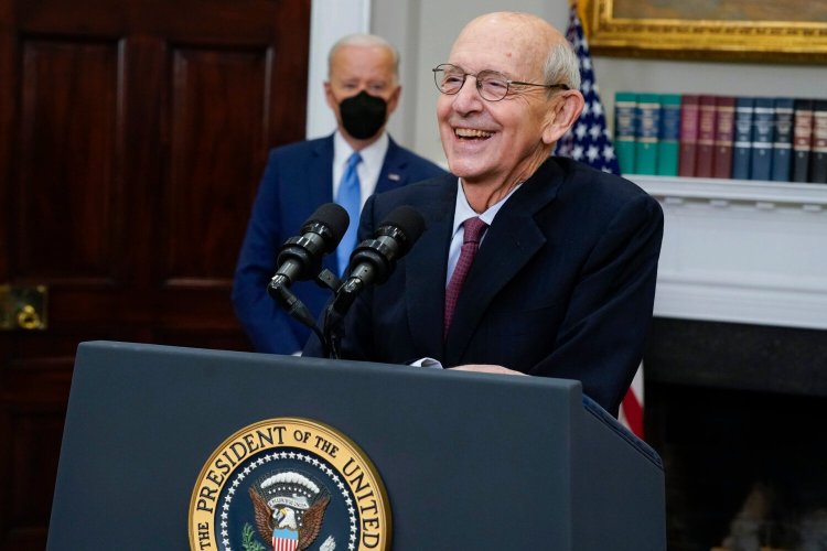 Supreme Court Associate Justice Stephen Breyer announces his retirement in the Roosevelt Room of the White House in Washington on Thursday, with  President Biden standing at rear.  looks on. 