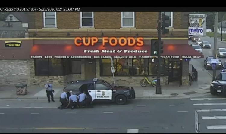 In this image from surveillance video, Minneapolis police officers from left, Tou Thao, Derek Chauvin, J. Alexander Kueng and Thomas Lane are seen attempting to take George Floyd into custody in Minneapolis, Minn., on May 25, 2020. 