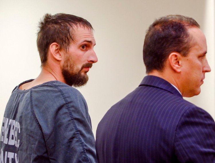 Nicholas Lovejoy, left stands with his attorney Darrick Banda during initial appearance on murder charges on Oct. 25, 2019, at Capital Judicial Center in Augusta. Lovejoy is charged with killing his girlfriend, Melissa Sousa, at their Waterville apartment. 