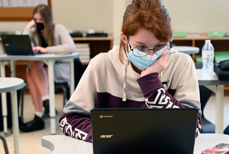 Jossolyn Riccardo, a junior at Old Orchard Beach High School, works on a computer during an anatomy and physiology class Tuesday.