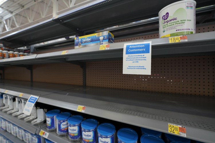 Shelves typically stocked with baby formula sit mostly empty at a store in San Antonio on May 10. 