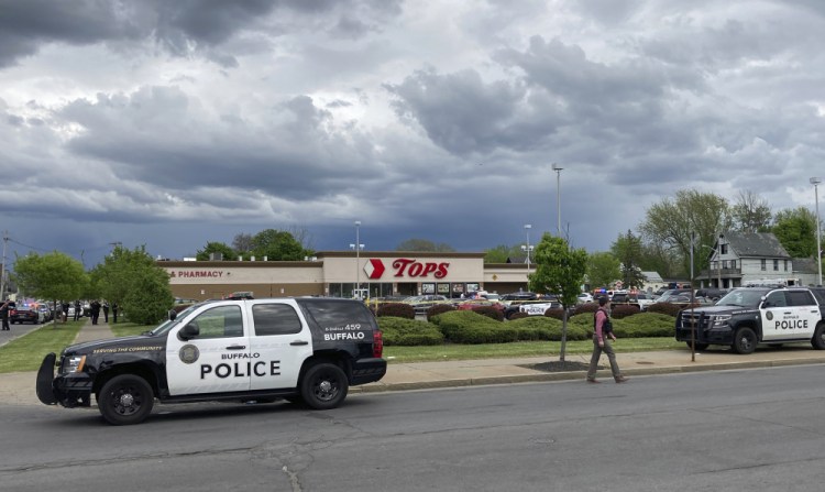 Buffalo Police respond to a shooting at Tops Friendly Market in Buffalo, N.Y., on Saturday.