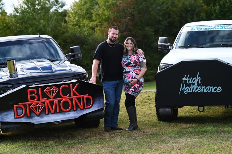 Ryan and Candace Pelletier of Benton, with their trucks, got engaged at the Fryeburg Fair's truck pulling event in 2019. They're expecting their first child in December. 
