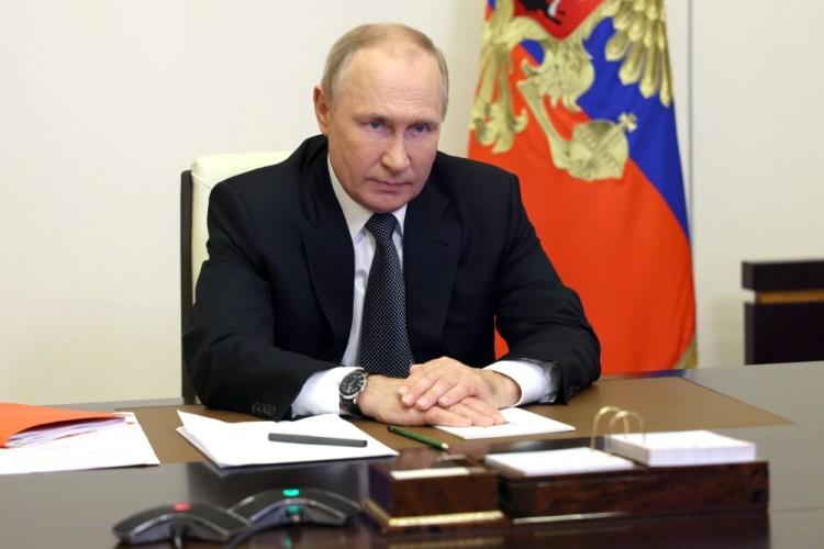 Russian President Vladimir Putin declared martial law in the annexed portions of Ukraine under his control.