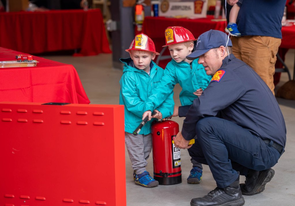 Photos Auburn department lets children try hand at firefighting during