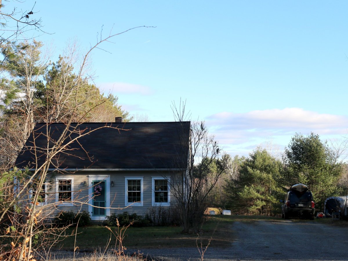 The home at 15 Point Road in Belgrade, seen Monday, was the scene of a shooting Sunday night. Christina Bell, 58, was shot at her home. Her son, 26-year-old Samuel Bell, has been charged with elevated aggravated assault in the shooting.