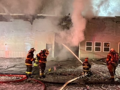 Fire heavily damages building, equipment, tow trucks in Rumford